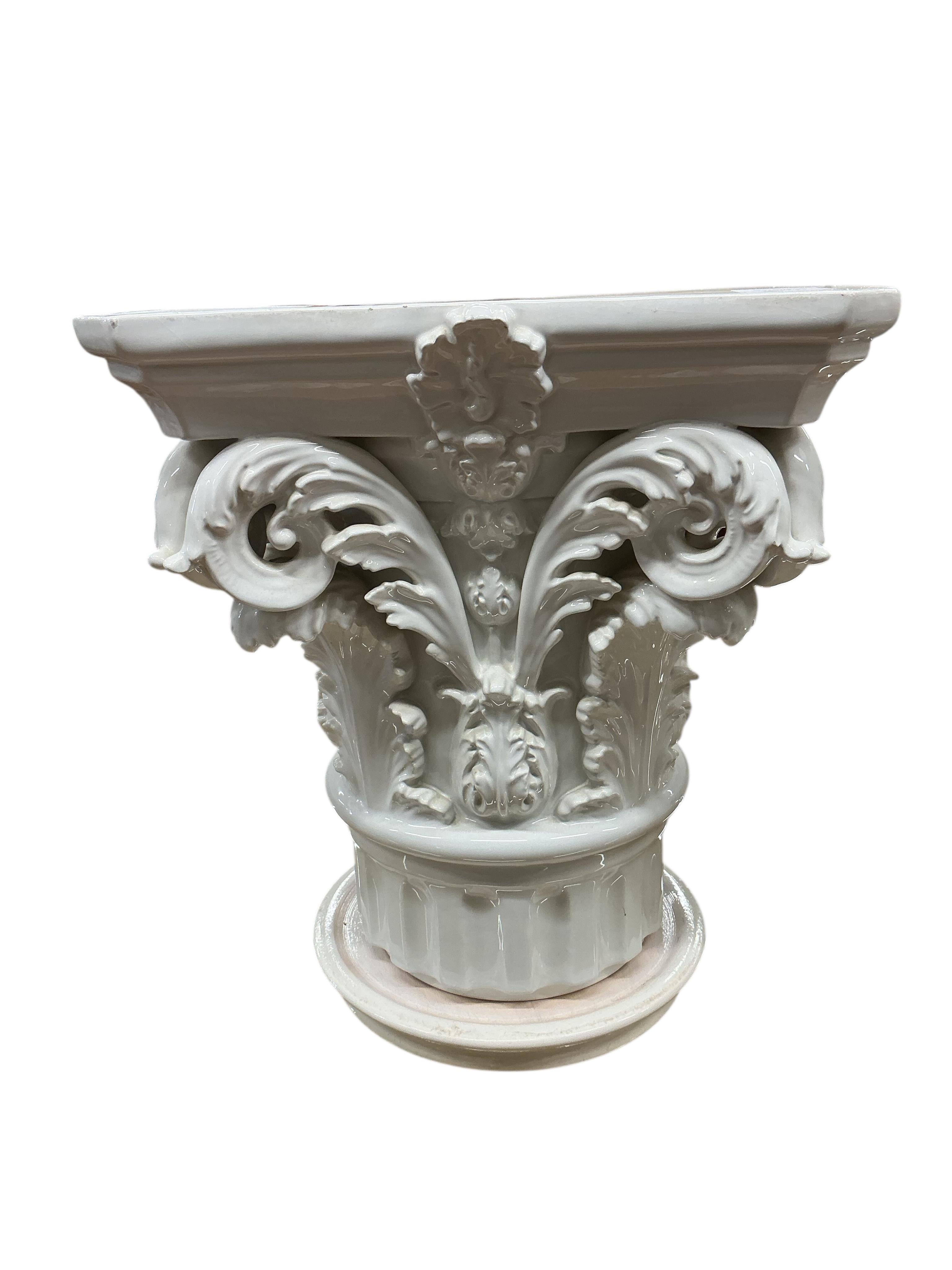 A pair of Italian VBC Ceramica Corinthian column capital pedestals, height 47cm